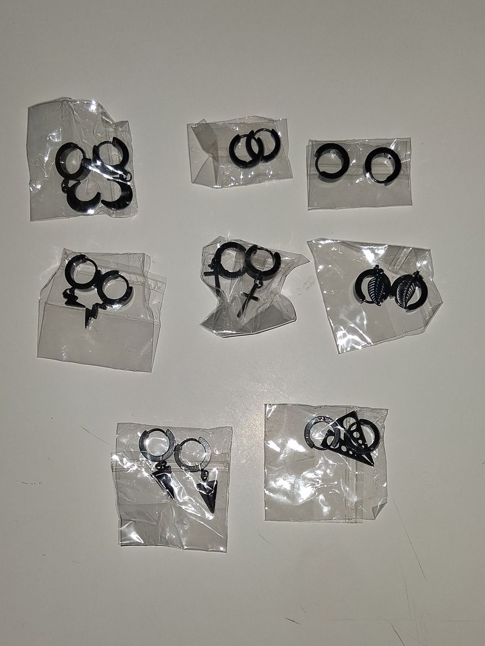 Black Mini Hoop Earrings With Multiple Charms